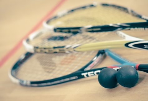 A collection of squash equipment.