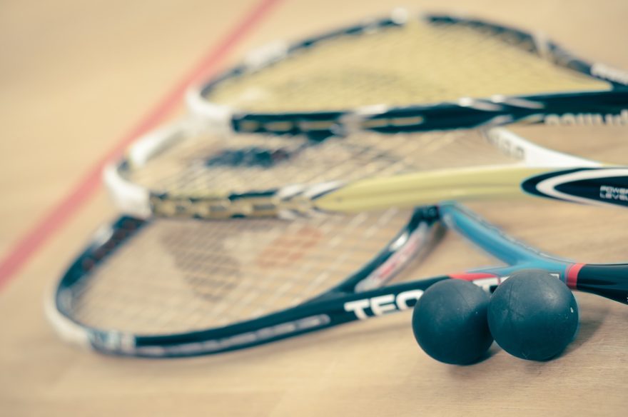 A collection of squash equipment.